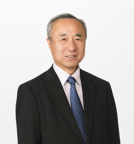 Portrait photo of NGK FINE MOLDS, INC. CEO Katsumi Morita.